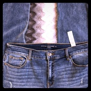 Platinum Zip Denim Jegging. Ripped look w bling.